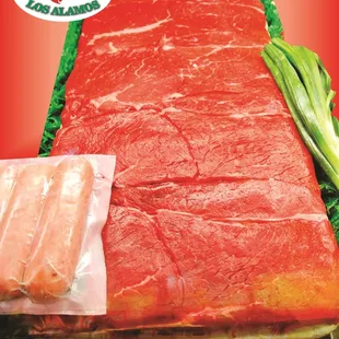 a piece of meat wrapped in plastic