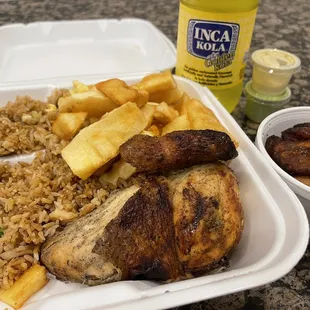 chicken, rice, and vegetables in a styrofoam container