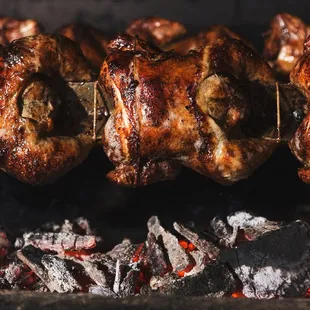 roasting chicken on a grill