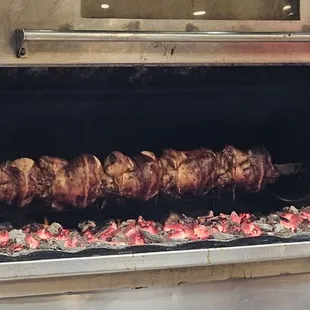 Those beautiful birds perfectly seasoned and charboiled over coal.