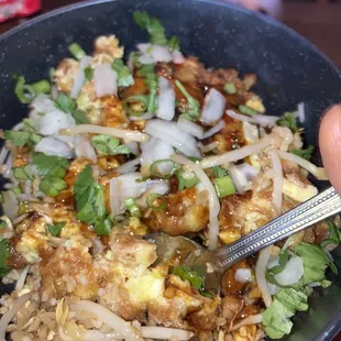 My 137. Egg Foo Young once I plated it up and topped with chopped onion and cilantro