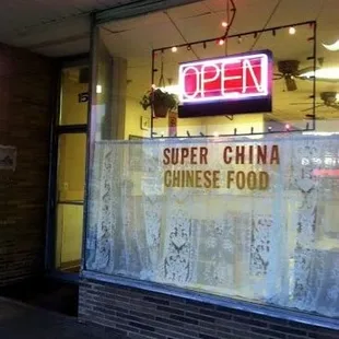 a neon sign for a chinese restaurant