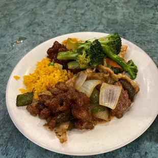 beef, broccoli, and yellow rice