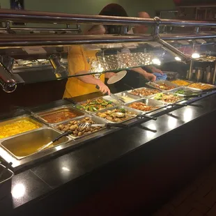 a man preparing food in a restaurant