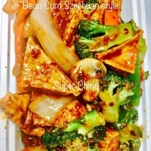 a close up of a meal in a styrofoam container