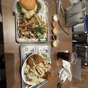 hot honey sandwich with loaded fries with cajun seasoning  crispy avo salad