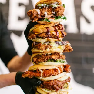 a stack of fried chicken sandwiches