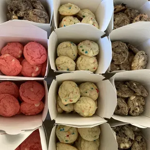 a variety of cookies in boxes