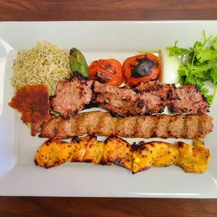 a plate of meat and vegetables