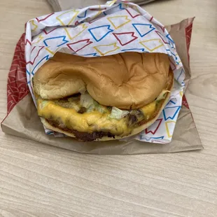 Supposedly a plain burger... they messed up, instead of making me a new burger they lazily scraped off the stuff I didn't want.
