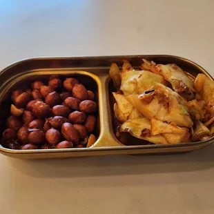 Complimentary appetizer: peanuts and Sichuan pickled cabbage