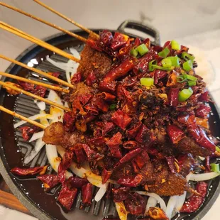 a plate of meat and vegetables