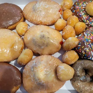 Variety of donuts and donut holes.