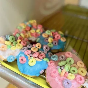 a close up of a variety of donuts
