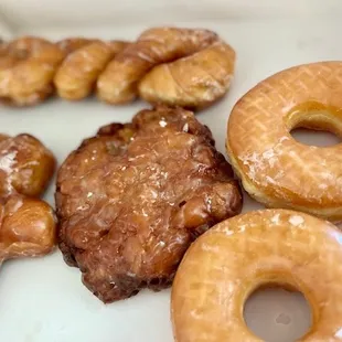 a variety of doughnuts in a box