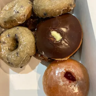 a variety of doughnuts in a box