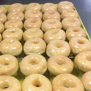 glazed donuts on a cooling rack