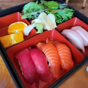 a tray of sushi