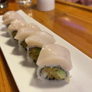 sushi rolls on a white plate