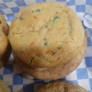 a chocolate chip cookie with sprinkles