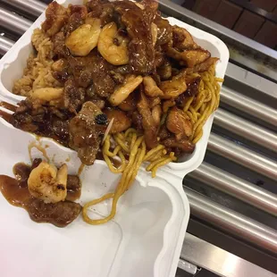 Chicken beef and shrimp teriyaki. Half noodles half fried rice.