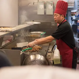 Chef cooking up some chicken!