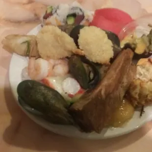 piling it on--mussels, shrimp, rib, sashimi etc.
