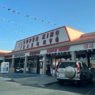 a car parked in front of the store