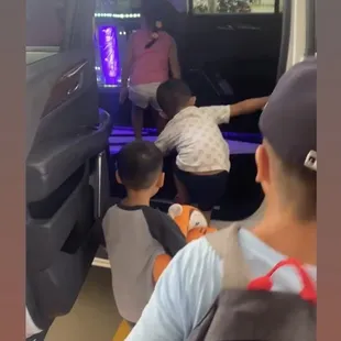 Kids hopping in to their fanciest ride experience!