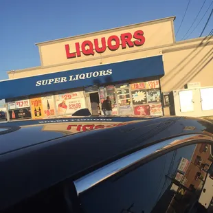 a liquor store on a sunny day