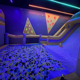 Different angle of giant slide with ball pit