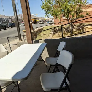a table and chairs outside