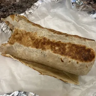a burrito wrapped in foil