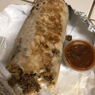 Left the chili  next to it so you can see how big it is huge a full of meat