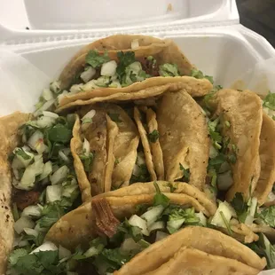 tacos in a styrofoam container