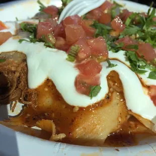 Pork tamales with everything on it. Not bad for a couple of bucks each.