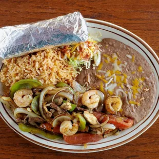 The Popular Mixed Fajitas Plate Steak, chicken and Shrimp fajitas