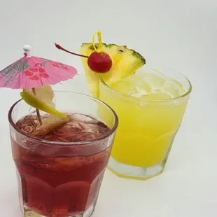 wo cocktails with cocktail umbrellas