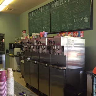 Front of house with me u and frozen yogurt on tap.