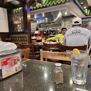 a group of people sitting at a table