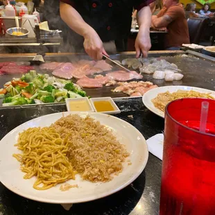 Cooking veggies, steak, shrimp
