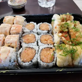 Middle spicy salmon roll, Right Virginia Beach Roll. I don't remember left.