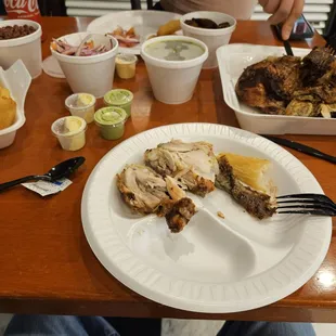 Chicken,  Yucca, Rice/Beans, Creamed Spinach, Plantain, Onion Tomato Salad.