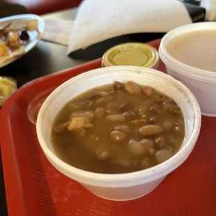 two bowls of soup on a tray