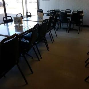 a table and chairs in a restaurant
