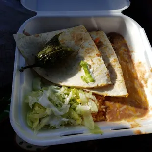 a meal in a styrofoam container