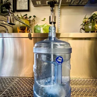 a water dispenser in a kitchen