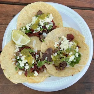 three tacos on a plate