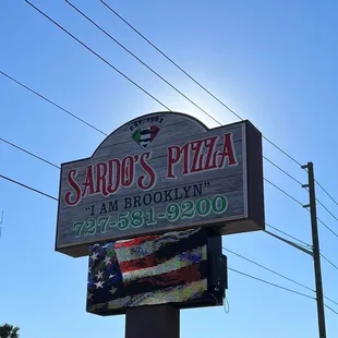 a sign for sardo&apos;s pizza