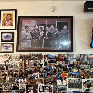 a wall full of photos